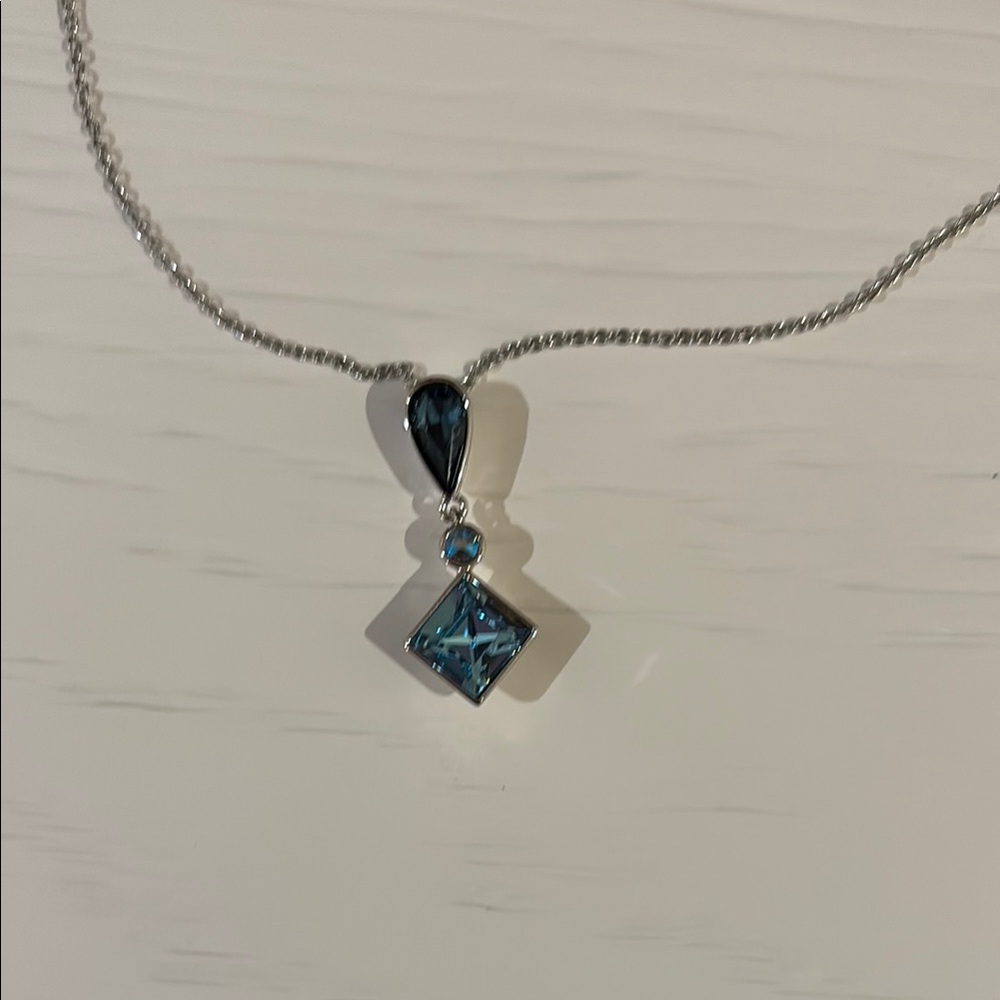 Touchstone Crystal pendant necklace. Silver.